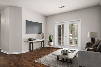 Spacious Living Area With Wood-Style Flooring